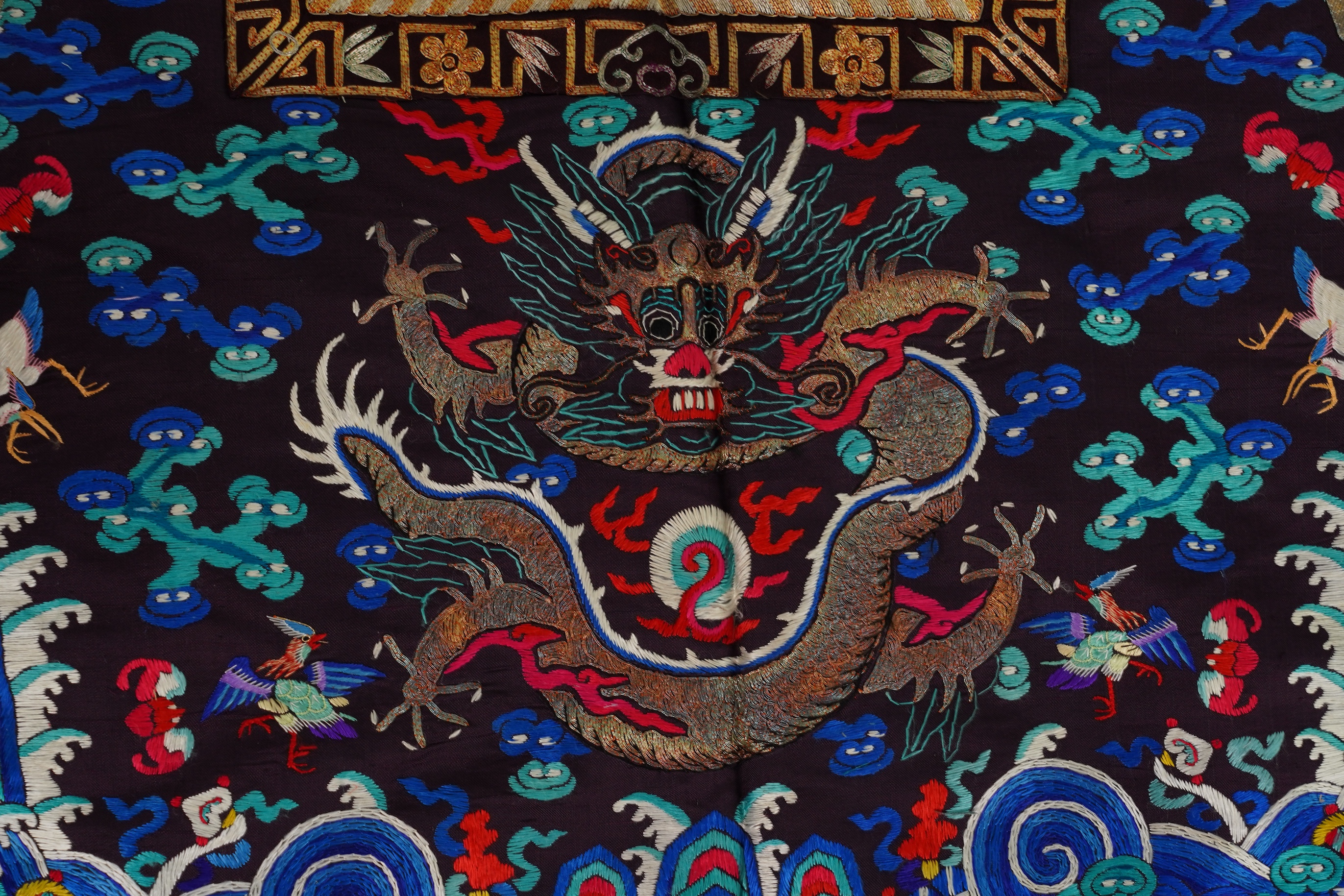 A Chinese embroidered silk vest, xiapei, early 20th century